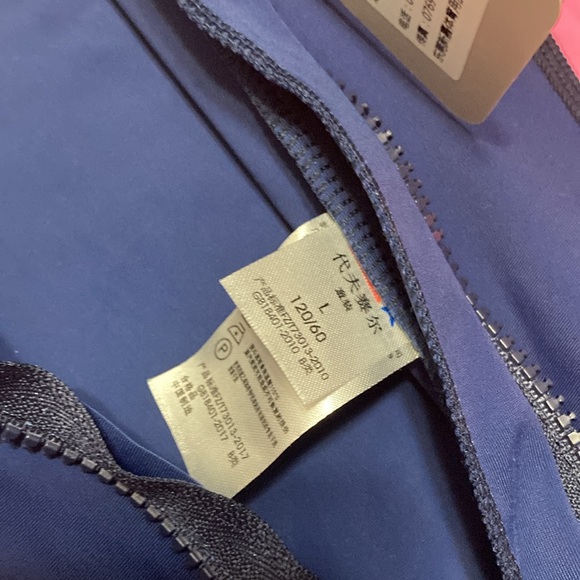 NWT rashguard with zipper for easy dressing! Nice stretchy nylon.Full length - Picture 3 of 4